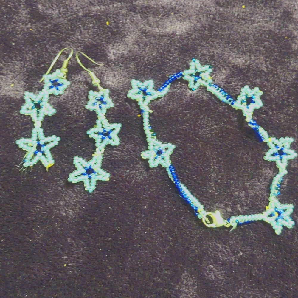 New! 1 of a kind Blue stars Bracelet and earrings set.